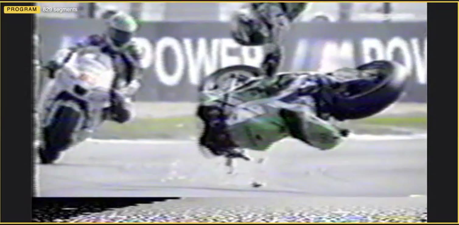Beatknife's program monitor: a MotoGP tape cut to the beat, through a VHS master and a bitcrush that fires on every slot